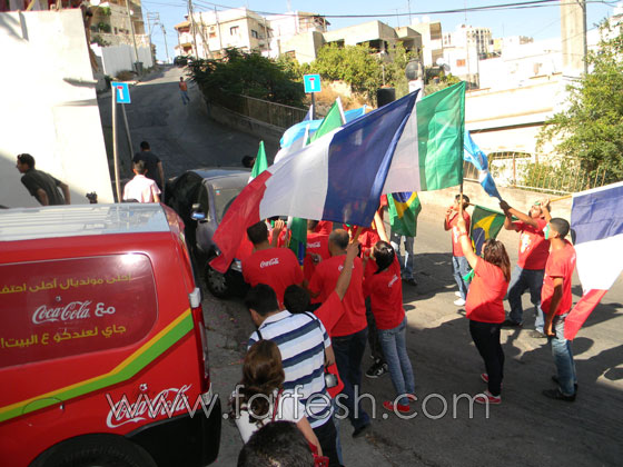 قافلة كوكاكولا مونديال تطوف شوارع الناصرة وتوزع الهدايا    صورة رقم 56