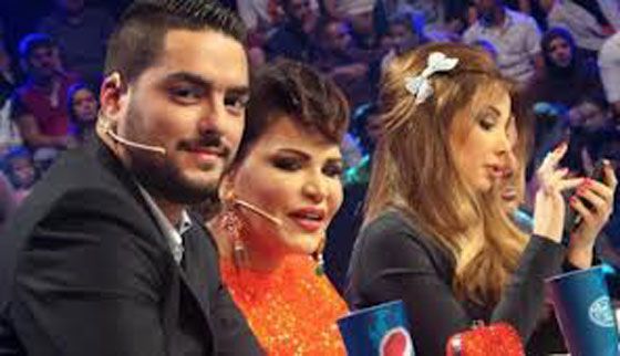 بعد انتقاد جاكيت وحقيبة احلام البرتقالية استشارت الجمهور بلون فستانها الجديد صورة رقم 4 بعد انتقاد جاكيت وحقيبة احلام البرتقالية استشارت الجمهور بلون فستانها الجديد صورة رقم 4