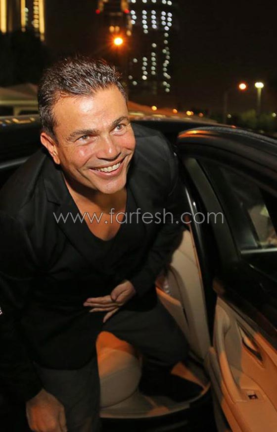 عمرو دياب في حفل الكويت ينزل عن المسرح ليسلّم على الجمهور صورة رقم 19 عمرو دياب في حفل الكويت ينزل عن المسرح ليسلّم على الجمهور صورة رقم 19