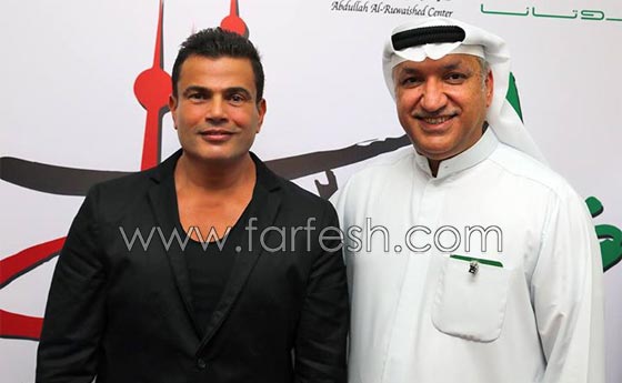 عمرو دياب في حفل الكويت ينزل عن المسرح ليسلّم على الجمهور صورة رقم 18 عمرو دياب في حفل الكويت ينزل عن المسرح ليسلّم على الجمهور صورة رقم 18