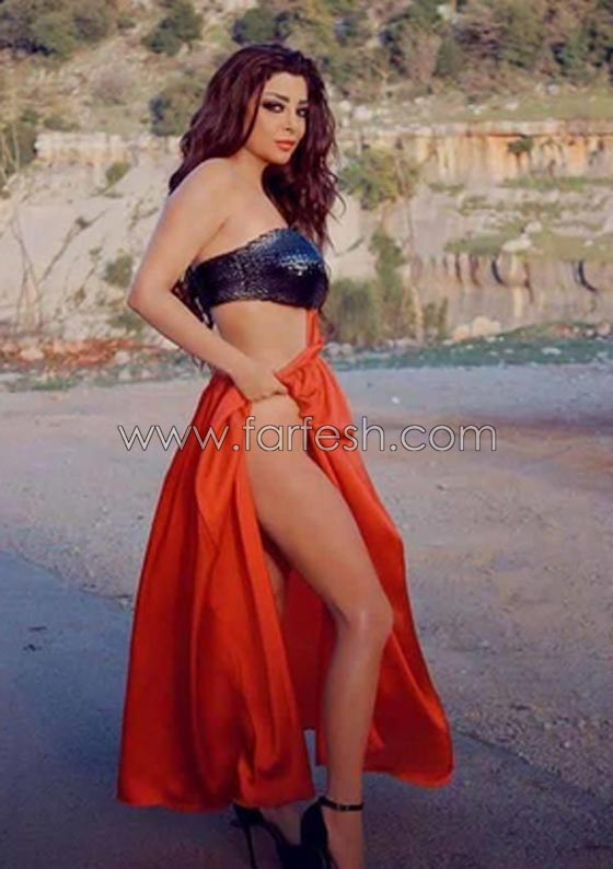 صور هيفاء وهبي بملابس شفافة و بطن مكشوف في مطار قبرص صورة رقم 5 صور هيفاء وهبي بملابس شفافة و بطن مكشوف في مطار قبرص صورة رقم 5