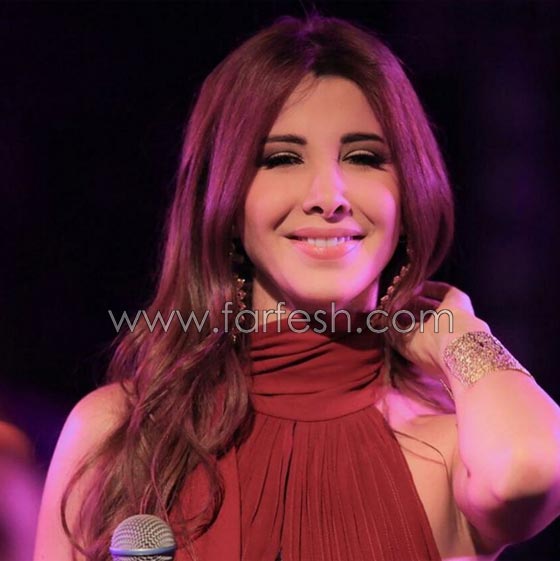 صور نانسي عجرم تشعل أجواء المغرب وتتألق بفستان احمر يفيض انوثة واناقة صورة رقم 7 صور نانسي عجرم تشعل أجواء المغرب وتتألق بفستان احمر يفيض انوثة واناقة صورة رقم 7