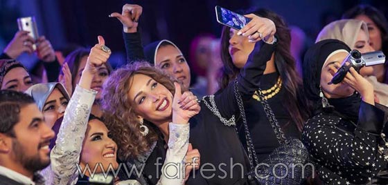 صور تامر حسني يغني في حفل تخرج زوجته بسمة بوسيل من اكاديمية الازياء صورة رقم 13 صور تامر حسني يغني في حفل تخرج زوجته بسمة بوسيل من اكاديمية الازياء صورة رقم 13