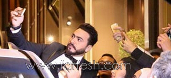تامر حسني يهرب من فتاة تهحم عليه وتفضح غناءه بلاي بلاك! صورة رقم 4 تامر حسني يهرب من فتاة تهحم عليه وتفضح غناءه بلاي بلاك! صورة رقم 4