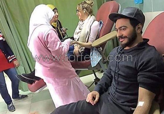 صور تامر حسني مع زوجته بسمة بوسيل يشاركان في حملة التبرع بالدم صورة رقم 10 صور تامر حسني مع زوجته بسمة بوسيل يشاركان في حملة التبرع بالدم صورة رقم 10