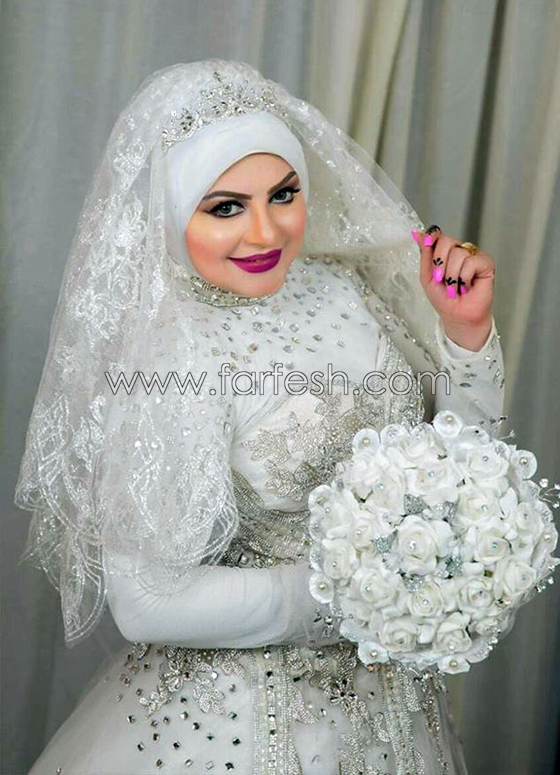 صور فساتين زفاف فنانات دخلن القفص الذهبي هذا العام.. أيها الأجمل؟ صورة رقم 17 صور فساتين زفاف فنانات دخلن القفص الذهبي هذا العام.. أيها الأجمل؟ صورة رقم 17