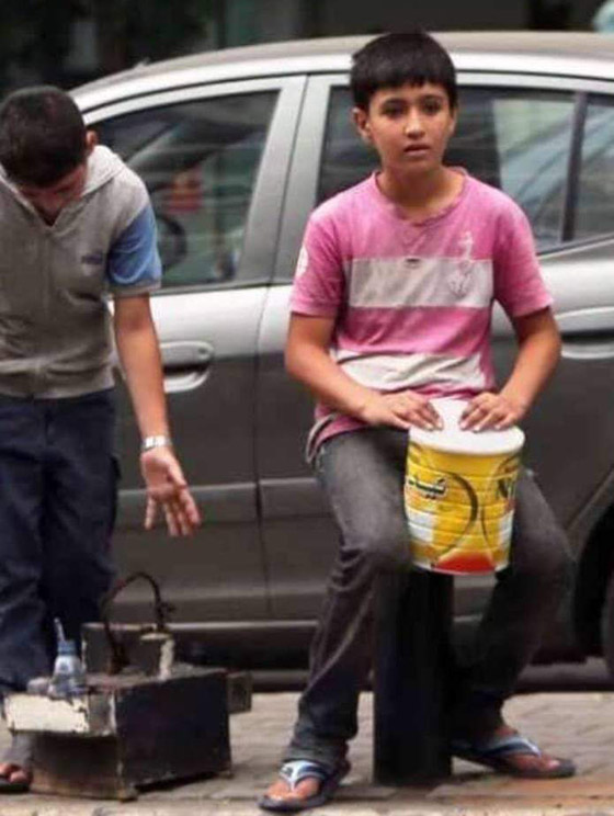 صور وفيديو: أحمد الزعبي طفل لاجئ ماسح احذية يفقد حياته هربا من الشرطة! صورة رقم 1