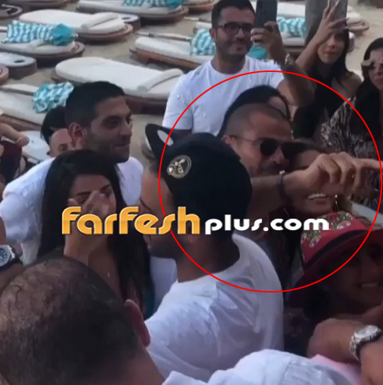 فيديو عمرو دياب ودينا الشربيني يرقصان على الشواطئ بملابس جريئة صورة رقم 2