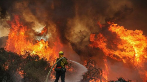 كاليفورنيا جحيما برتقاليا: النيران تلتهم مساحات قياسية ولا تزال مشتعلة صورة رقم 31