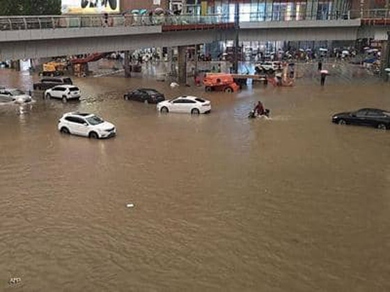 فيضانات كارثية تجتاح الصين.. قتلى بالمئات وخسائر بالمليارات صورة رقم 1