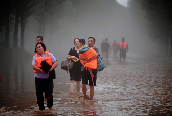 الصين.. بكين تشهد أكبر معدل لهطول الأمطار منذ 140 عاما (صور) صورة رقم 12