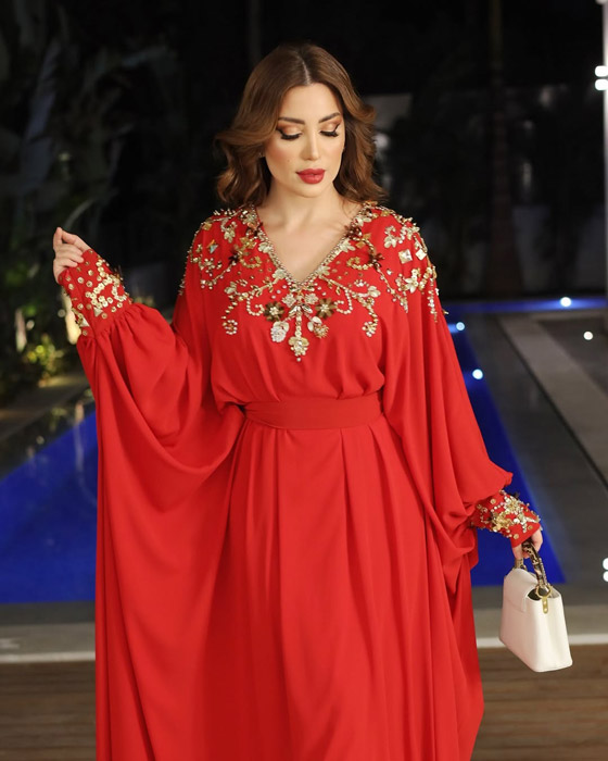 نسرين طافش في أحدث ظهور تتألق بالقفطان الأحمر بعد زواجها صورة رقم 2