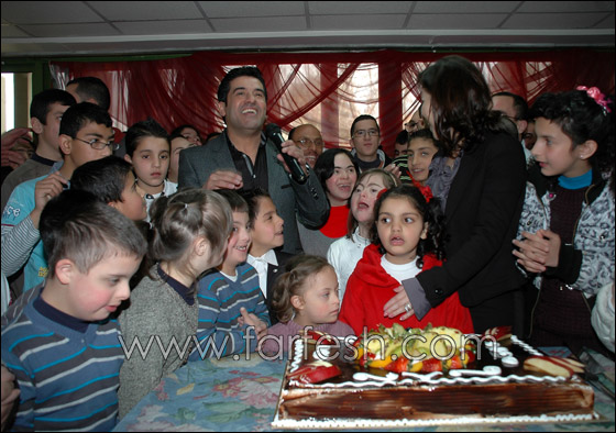رضا يحتفل بالأيتام  وذوي الإحتياجات الخاصة  صورة رقم 2