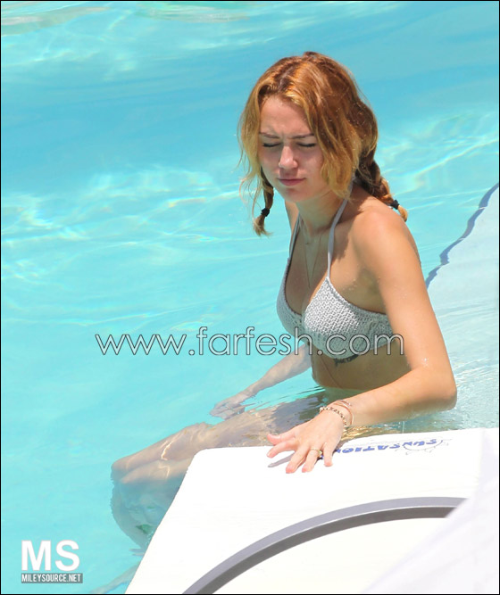 بالصور.. مايلي سايرس في حوض السباحة مع شايني توماس  صورة رقم 17
